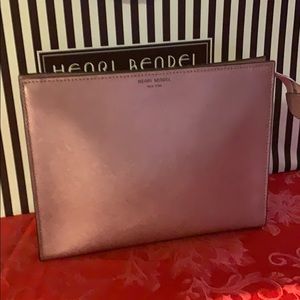 Henri Bendel metallic pink leg cosmetic bag
